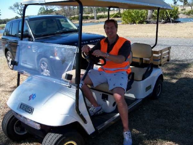 David Butler on golf cart.jpg